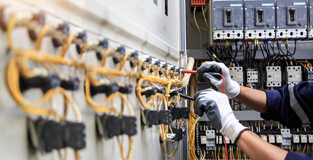Professional Electrician technician working in Texanna, OK